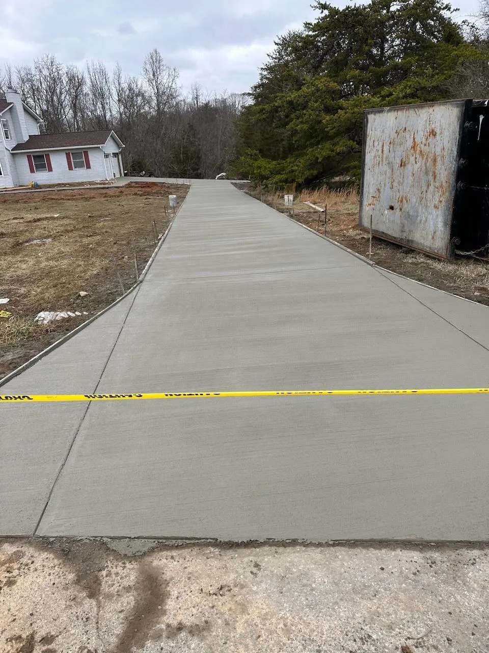 Completed concrete driveway in the DMV region